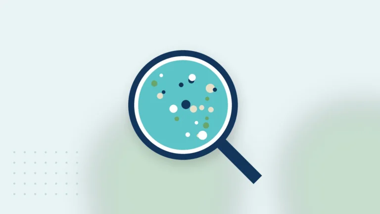 Illustration: a magnifying glass over a water sample with particles